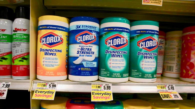 shelf in a store lined with different types of Clorox disinfecting wipes