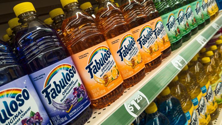 a store shelf lined with different Fabuloso cleaners