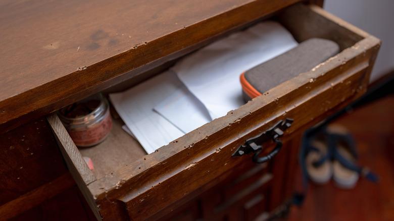Pulled out drawer from antique desk