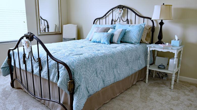 Wrought iron bed with bed skirt