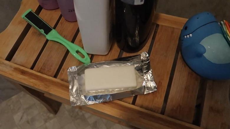 Soap dish improvised from aluminum foil