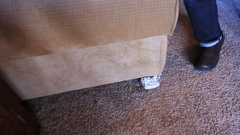 Improvised furniture slider using aluminum foil