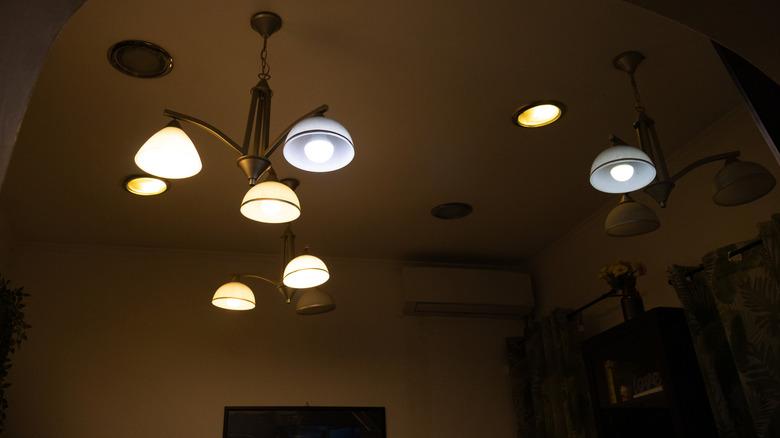 close up of artificial interior ceiling lights in a dimly lit room
