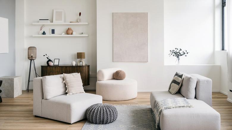 minimalist  modern living room with abstract art and neutral colors