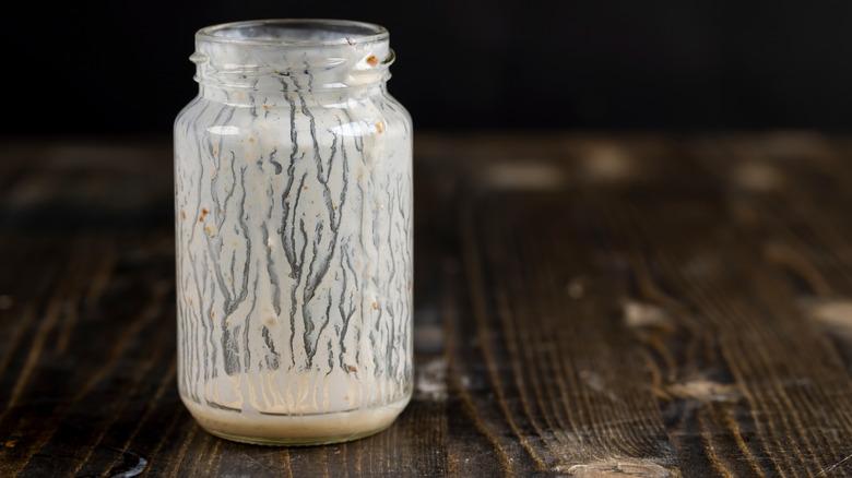 empty glass jar that needs washing