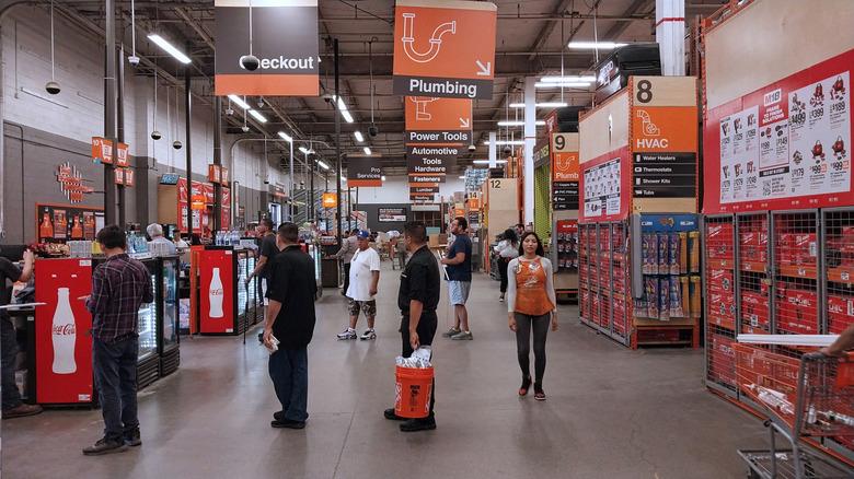 Customers wait in line at a Los Angeles Home Depot