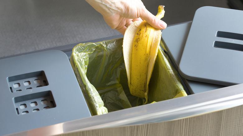 Banana tossed into compost bin with sealable lid