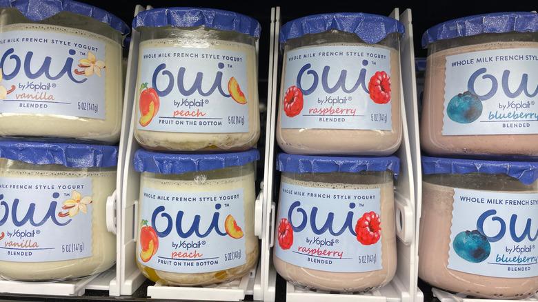 glass yoplait oui yogurt jars on store shelf