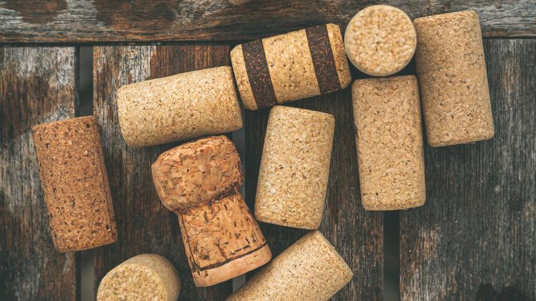 Wine corks on a wooden surface