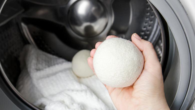Adding wool dryer balls to a dryer