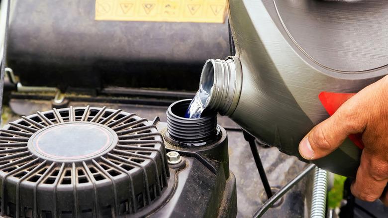 Adding fuel to a mower engine