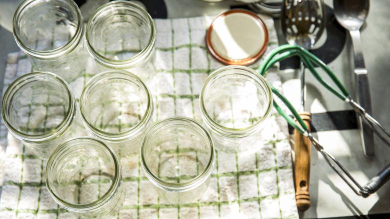 Empty mason jars on a towel