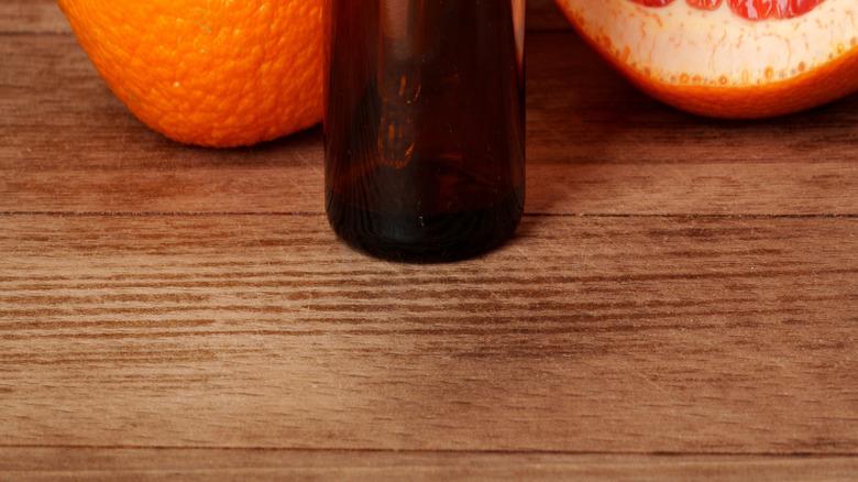 Grapefruit essential oil in a small bottle.